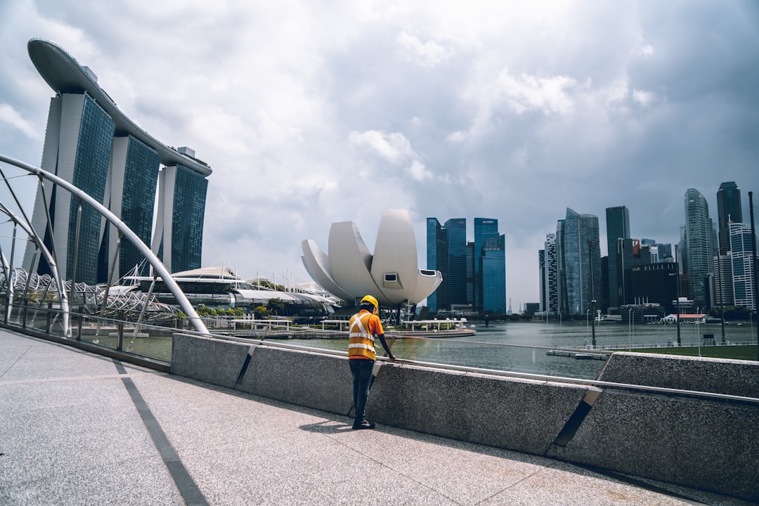 A Singapore architect reviews building plans designed to address the urban heat island effect in the Central District